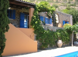ELOUNDA:  UNIQUE STONE BUILT HOUSE WITH INTERNAL COURTYARD, GARDEN, POOL AND TENNIS COURT